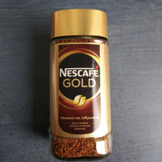 Кава розчинна сублімована з додаванням меленої арабіки Nescafe Gold 190г.